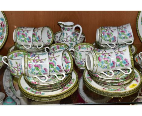 A QUANTITY OF EARLY 20TH CENTURY CAULDON LTD INDIAN TREE PATTERN TEA AND COFFEE WARES, comprising a milk jug, cracked, sugar 