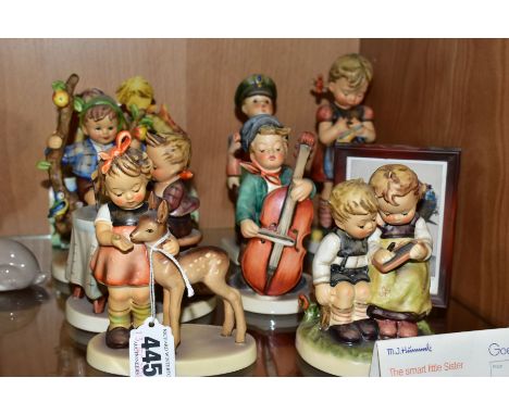 SEVEN HUMMEL FIGURES AND THREE RELATED ITEMS, the figures include 'Friends', 'The Smart Little Sister' with folded card displ