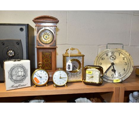 A GROUP OF SIX VARIOUS CLOCKS, comprising a late 19th century miniature longcase clock, height 27.5cm, a brass cased Imhof ca