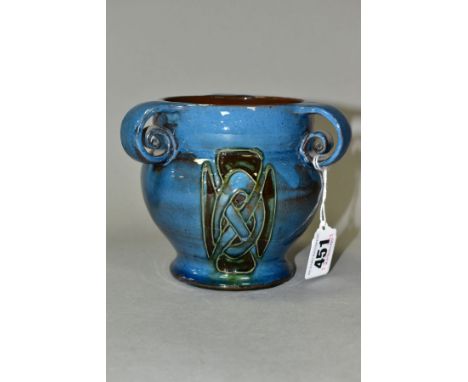 A C H BRANNAM BARUM POTTERY THREE HANDLED VASE, produced for Liberty &amp; Co, tube lined decoration with blue glaze, impress