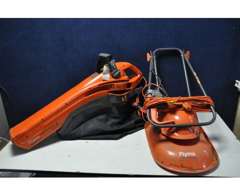 A FLYMO MEV750 garden vac with bag and a Flymo MLITE-28 lawn mower (both PAT pass and working) (2)