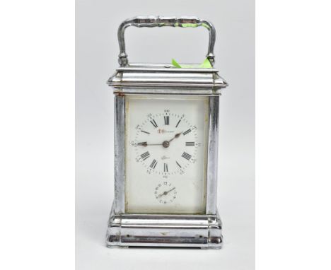 A FRENCH CARRIAGE CLOCK, featuring a white dial signed 'J.Bennett, Paris', Roman numerals, smaller Arabic dial beneath the ma
