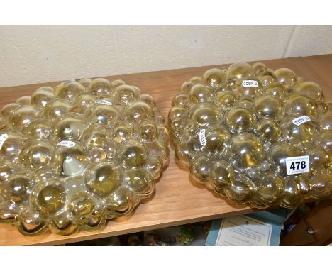 A PAIR OF VINTAGE CEILING LIGHT FITTINGS OF CIRCULAR FORM, the moulded glass shades in the form of clustered rounded shapes, 