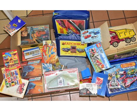 A BOX OF ACCESSORIES AND BOXES FOR DIE-CAST VEHICLES, to include two boxed Matchbox Big Mx  Power Activator tools, a BigMx me