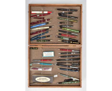 THIRTY ONE VINTAGE AND MODERN FOUNTAIN PENS in a bespoke hinged wooden display case, the pens include two Blackbird, a Mentmo