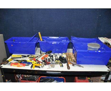 FOUR PLASTIC TRAYS CONTAINING A QUANTITY OF HAND TOOLS including a Ryobi Laser Measure, a Stanley Shoulder brace, a boxed Las