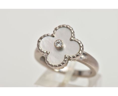 A VAN CLEEF &amp; ARPELS VINTAGE ALHAMBRA RING WITH BOX, with mother of pearl motif and central collet set brilliant cut diam