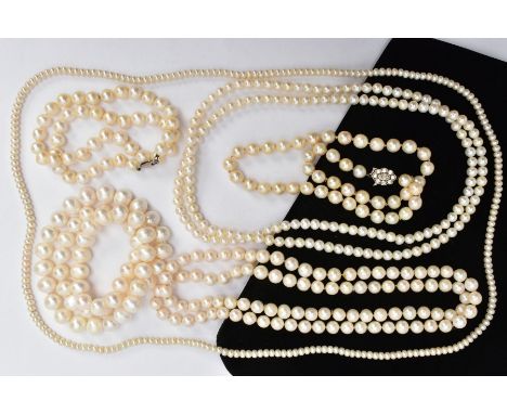 SIX STRANDS OF CULTURED PEARLS,  to include two strands of white pearls individually knotted, approximate pearl size 9mm, one