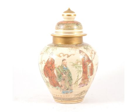 A Japanese satsuma ginger jar, painted with figures with bamboo to background, gilded highlights, domed cover with gilded fin