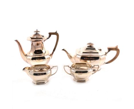 A silver four-piece tea set by Cooper Brothers &amp; Sons Ltd, comprising teapot (14.5cm), hot water jug (21cm), milk jug, su