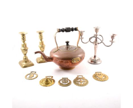 A copper kettle on a stand, copper warming pan, copper coal bucket, candlesticks, brasses etc.