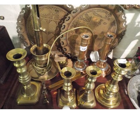 A Tray of Brass Ware to Include Brass Candle Sticks, Brass Table Lamp, Islamic Trays etc