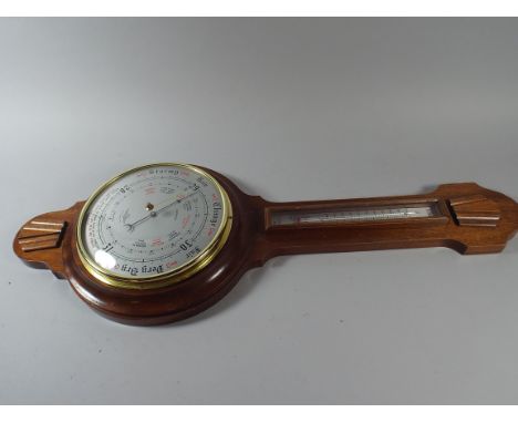 A 20th Century Wheel Barometer with Temperature Scale 