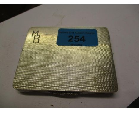 A silver engine turned cigarette case, initialed MB, Birmingham 1940 