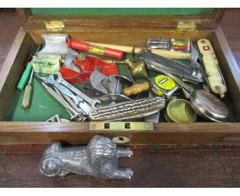 A late 19th century oak and brass military style case containing an early Swiss Army pen knife and others, miniature tools, c