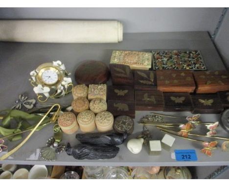 Mixed trinket boxes and ornaments, together with a small quartz bedside clock decorated with an enamelled water lily mount an