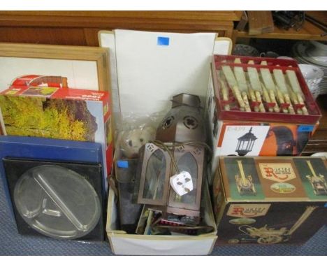 A new and boxed automatic lantern style outdoor sensor light, a retro pocket radio in original box, a transport timetable, tw
