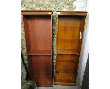 A yew wood open bookcase with five adjustable shelves and one fixed shelf on a plinth base, 71 6/8" x 23 1/2" x 11 1/2", alon