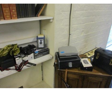 A selection of cameras and equipment to include flashes, boxed cameras, a Folkestone meter and a Rada cassette camera 