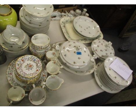 A large quantity of china to include a floral pattern part dinner service and a Spode Summer Blossom part tea service 