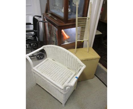 A Lloyd Loom chair and basket along with a bathroom rack 