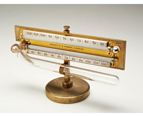 A POCKET HYGROMETER BY NEGRETTI &amp; ZAMBRA, LONDON, CIRCA 1890, the signed brass bedplate with silvered block scales and me
