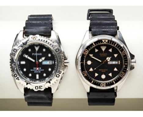 CASIO QUARTZ 'DIVERS' WATCH, c1980s, with black dial and day/date aperture and a Pulsar V736-6A6O quartz steel divers watch w