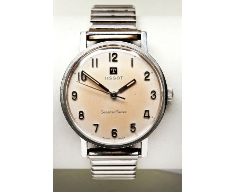 TISSOT SEASTAR SEVEN STEEL MANUAL WIND GENTS WATCH, 1960s, with Arabic numerals and expanding steel bracelet. PROVENANCE: The