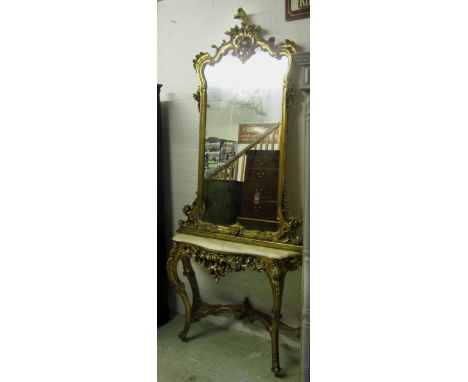 CONSOLE TABLE & MIRROR, Rococo style gilt framed, with a serpentine shaped onyx top and 'C' scroll and leaf decoration on cab