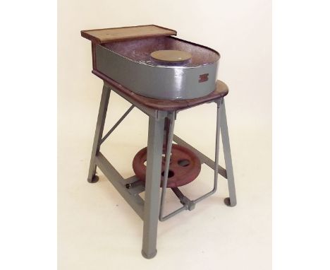 A vintage treddle potters wheel 