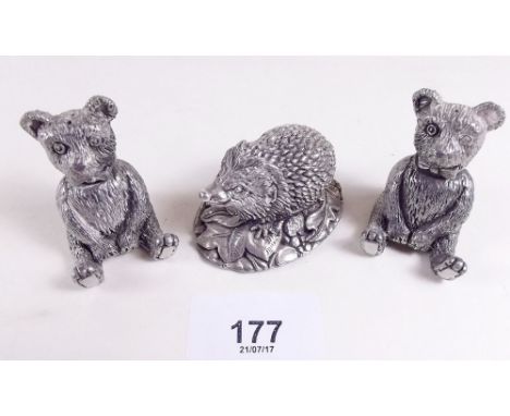 A silver filled miniature hedgehog and a silver plated teddy