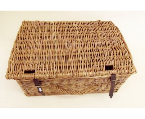 A wicker picnic hamper 