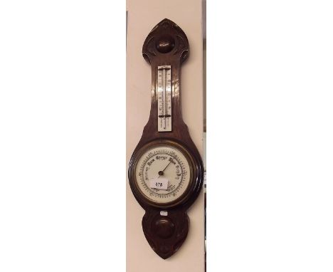 An oak barometer/thermometer