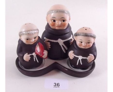 A Goebel Hummel four piece novelty cruet set in the form of monks 