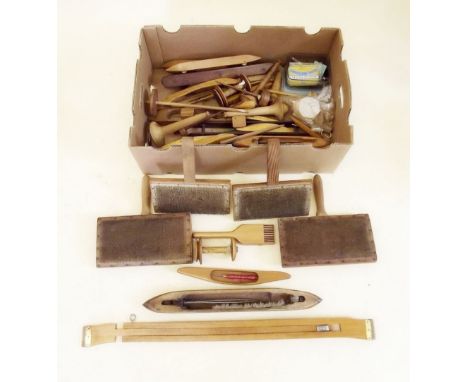A large box of weaving tools including bobbins, carders, shuttles etc.