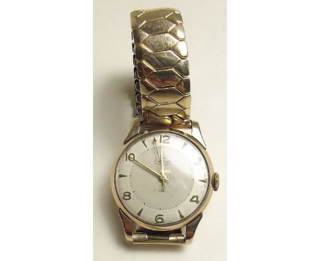 A vintage Smiths 9 carat gold gentlemans wrist watch with gold plated strap