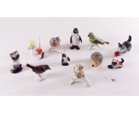 A collection of eleven Goebel figures including birds and penguins 