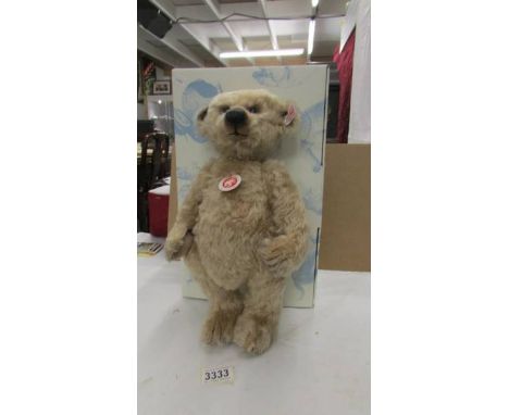 A boxed as new Steiff Teddy bear, June 2009 with certificate.