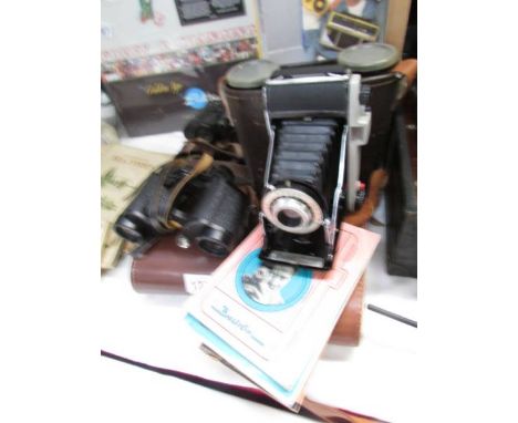 2 pairs of binoculats including Carl Zeiss, a Kodak Juniior II camera and 2 vintage camera books.