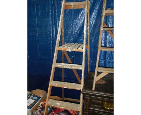 A wooden step ladder.