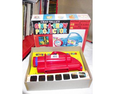 A Chad valley give-a-show projector complete in box