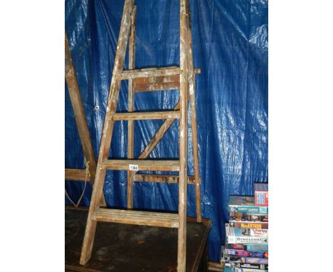 A wooden step ladder.