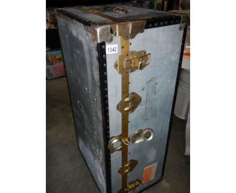 A large old cabin trunk.