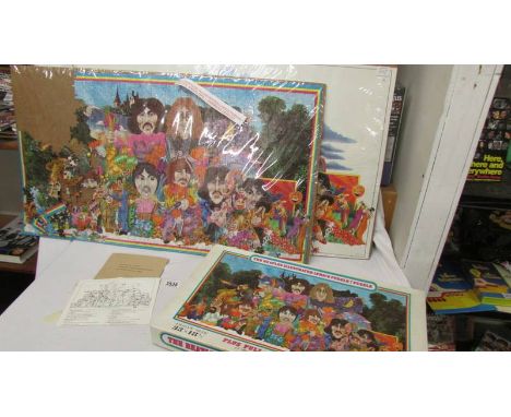 The Beatles Ilustrated Lyrics in a puzzle complete with poster, envelope and answers leaflet.