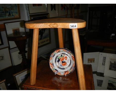 A good oak 3 legged stool with carved mouse (possibly Mouseman).