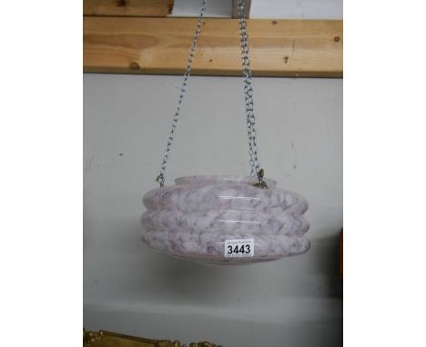 A hanging 'Flycatcher' lamp shade.