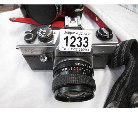 A Praktica super TL1000 camera.