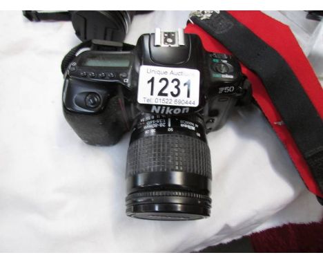 A Nikon F50 camera.