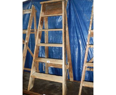 A wooden step ladder.