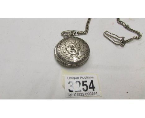 A pocket watch by Citron depicting JFK.